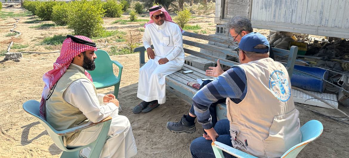 Mohamed Alnwairan (centre) explains how his farm has benefited from smart irrigation techniques. Mohamed Alnwairan (centre) explains how his farm has benefited from smart irrigation techniques.