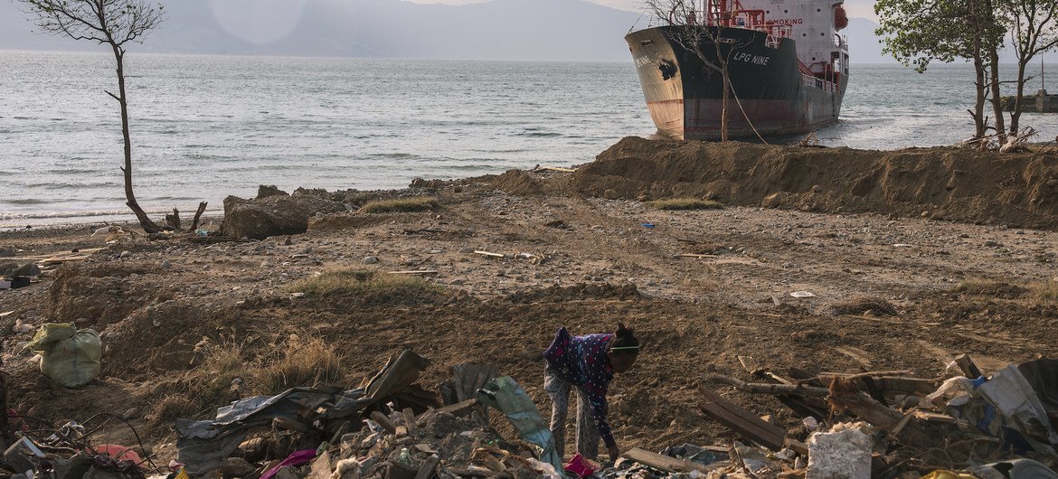 A woman in Indonesia searches through the rubble at a beach in Palu, Indonesia, that was entirely washed away by an October 2018 tsunami. (file) A woman in Indonesia searches through the rubble at a beach in Palu, Indonesia, that was entirely washed away by an October 2018 tsunami. (file)
