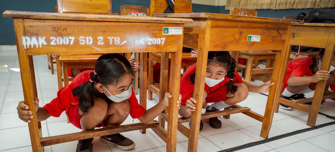 to Children in Indonesia practice tsumani preparedness drills at school. to Children in Indonesia practice tsumani preparedness drills at school.