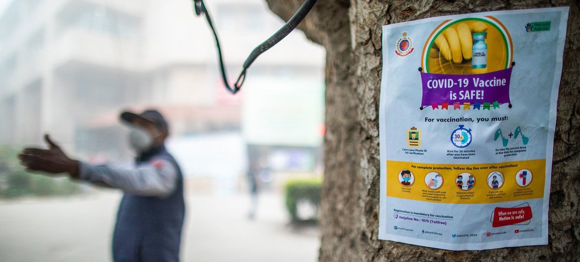 In New Delhi India, a poster plays a role in dispelling myths about the COVID-19 vaccine. In New Delhi India, a poster plays a role in dispelling myths about the COVID-19 vaccine.