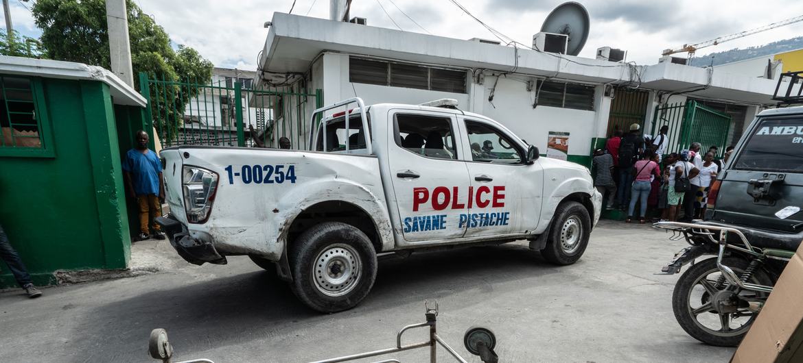 A police vehicle passes by the General Hospital in Port-au-Prince. A police vehicle passes by the General Hospital in Port-au-Prince.