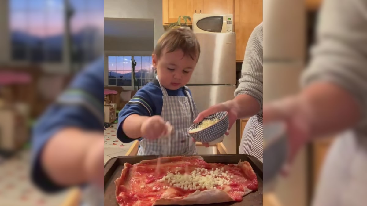 “Little Pizza Boi”: Internet Cannot Get Over Toddler Preparing Pizza Pie