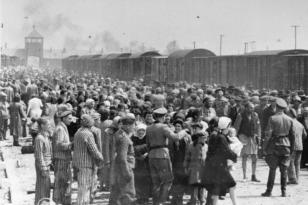 Jews from Subcarpathian Rus are subjected to a selection process on a ramp at Auschwitz-Birkenau, Poland. Jews from Subcarpathian Rus are subjected to a selection process on a ramp at Auschwitz-Birkenau, Poland.