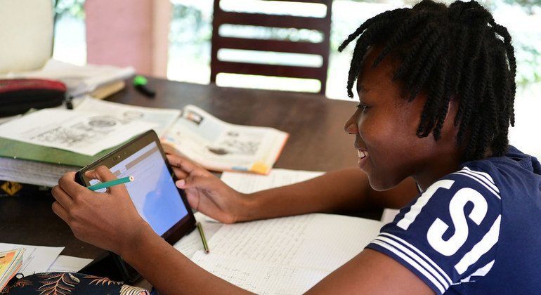A girl studies online at home in Abidjan in Côte d'Ivoire. A girl studies online at home in Abidjan in Côte d'Ivoire.