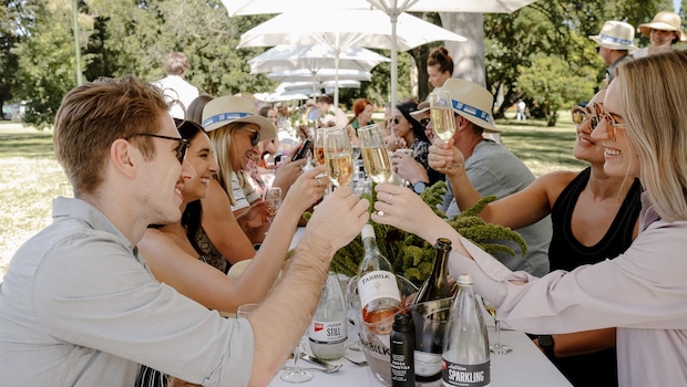 Visitors enjoying a meal at the Food & Wine Festival Visitors enjoying a meal at the Food & Wine Festival