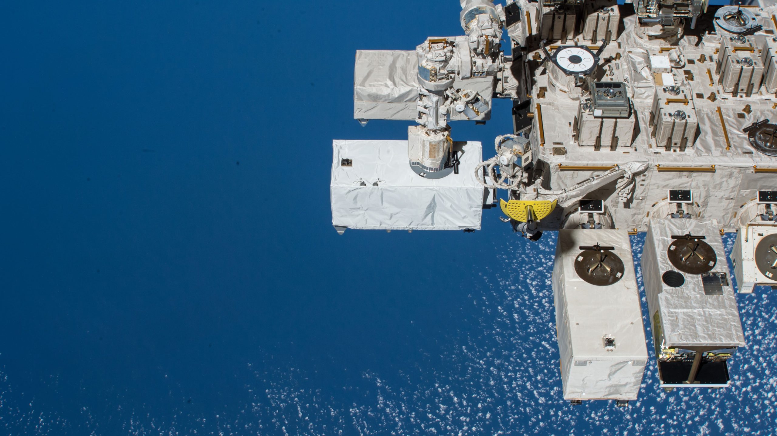 The International Space Station's ECOSTRESS instrument is shown outside of the space station.