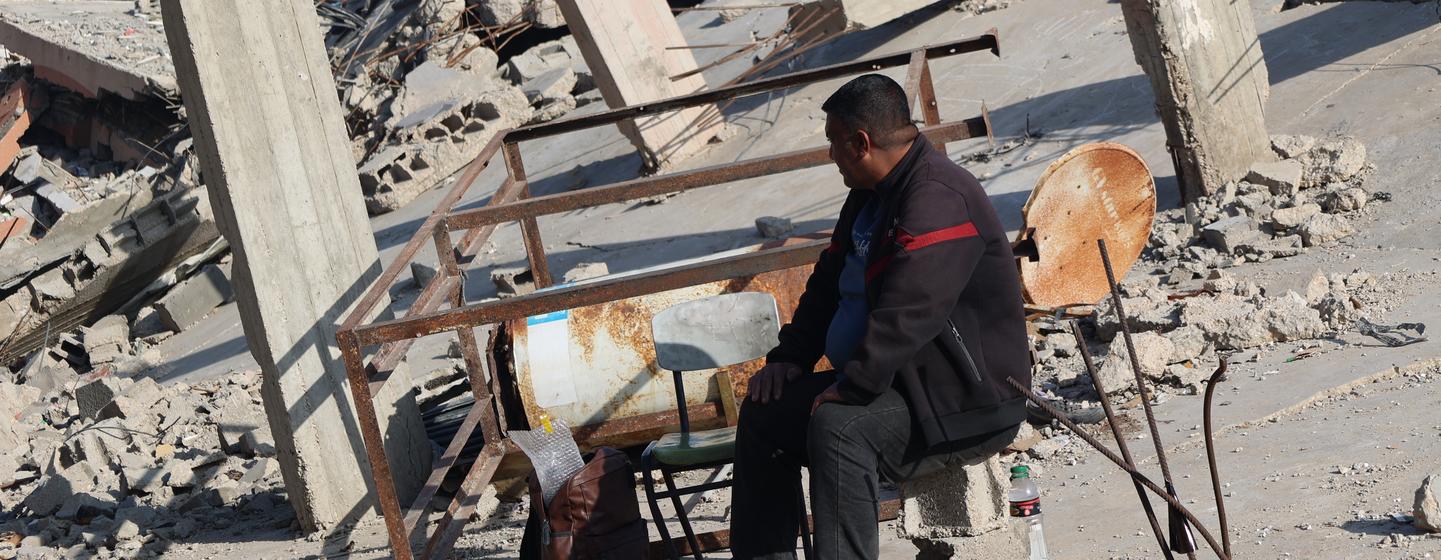 Ramadan Kutkut sits on the rubble of his house in Jabalia, in the northern Gaza Strip. Ramadan Kutkut sits on the rubble of his house in Jabalia, in the northern Gaza Strip.