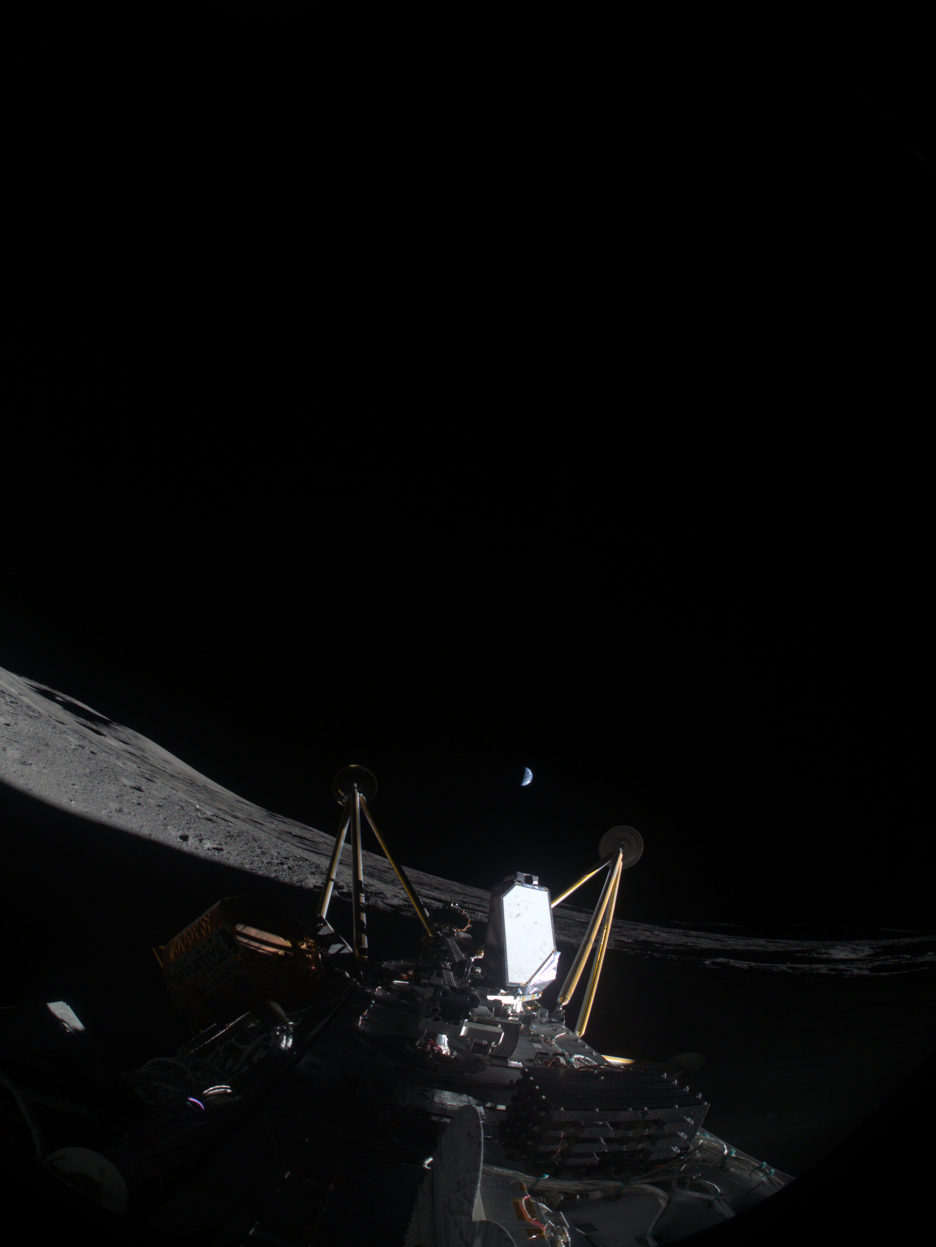 Intuitive Machines’ IM-2 captured an image March 6, 2025, after landing in a crater from the Moon’s South Pole. The lunar lander is on its side about 820 feet from the intended landing site, Mons Mouton. In the center of the image between the two lander legs is the Polar Resources Ice Mining Experiment 1 suite, which shows the drill deployed.