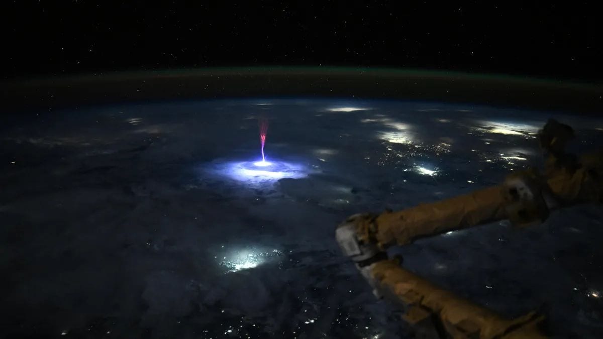 NASA Astronaut Captures Rare Red Sprite Over Storm from Space Station