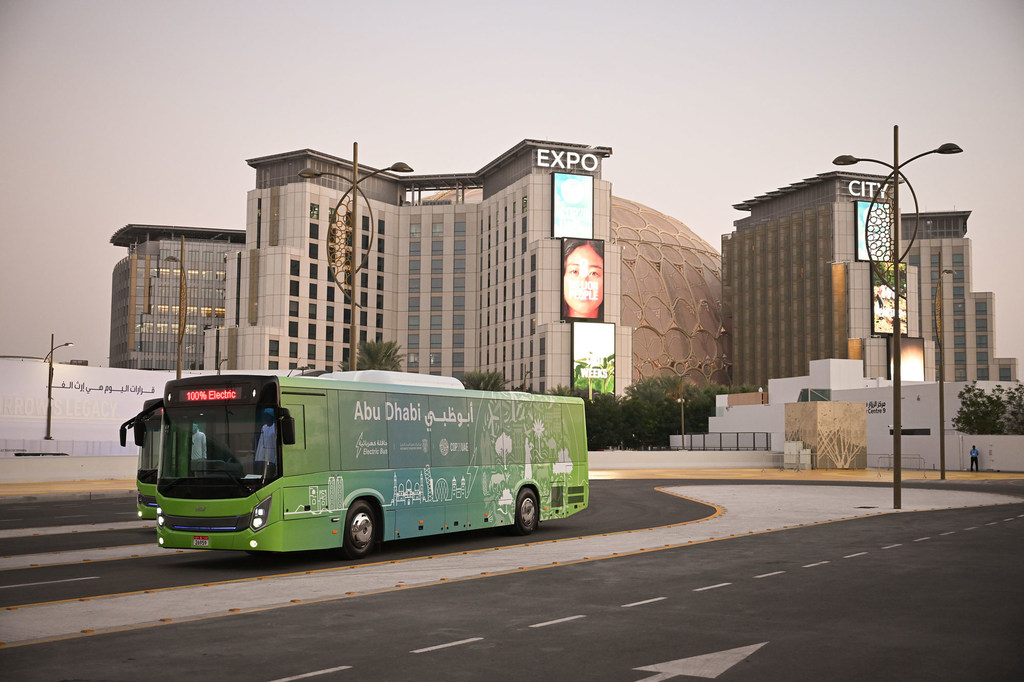 Shot of a 100% electric bus near Expo City in Dubai United Arab Emirates, where the UN Climate Change Conference (COP28) is under way. Shot of a 100% electric bus near Expo City in Dubai United Arab Emirates, where the UN Climate Change Conference (COP28) is under way.
