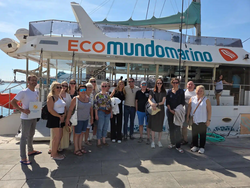Group of participants aboard a Mundo Marino catamaran in Málaga Port