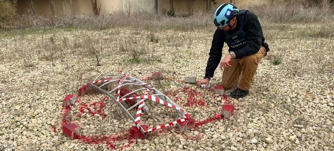 UNMAS conducts an explosive hazard assessment of a logistics base in Rafah. The explosive ordnance that was found was marked with warning signs.