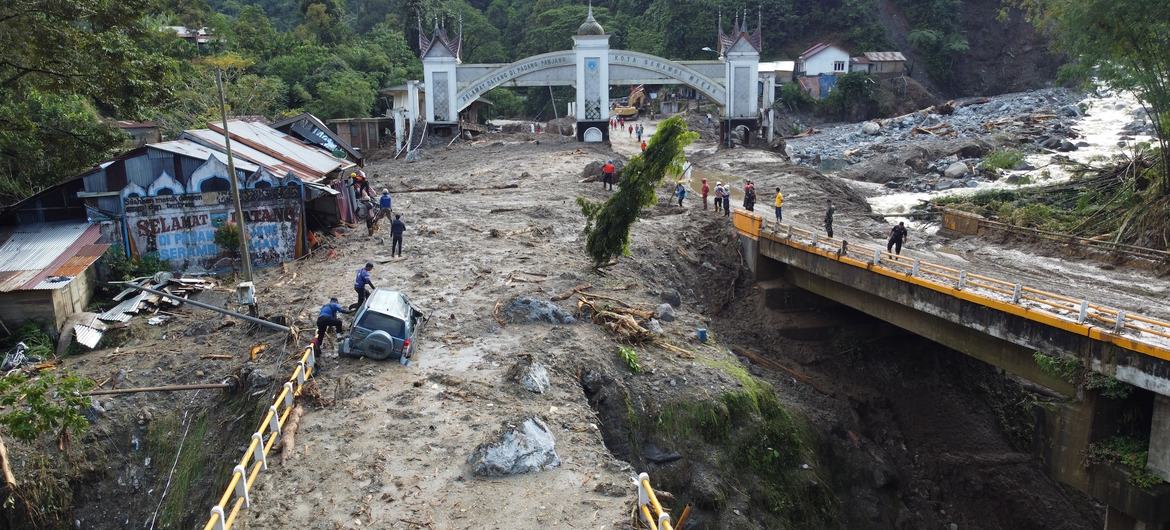 Bridges and access roads swept away by a landslide in West Sumatra, Indonesia. Bridges and access roads swept away by a landslide in West Sumatra, Indonesia.