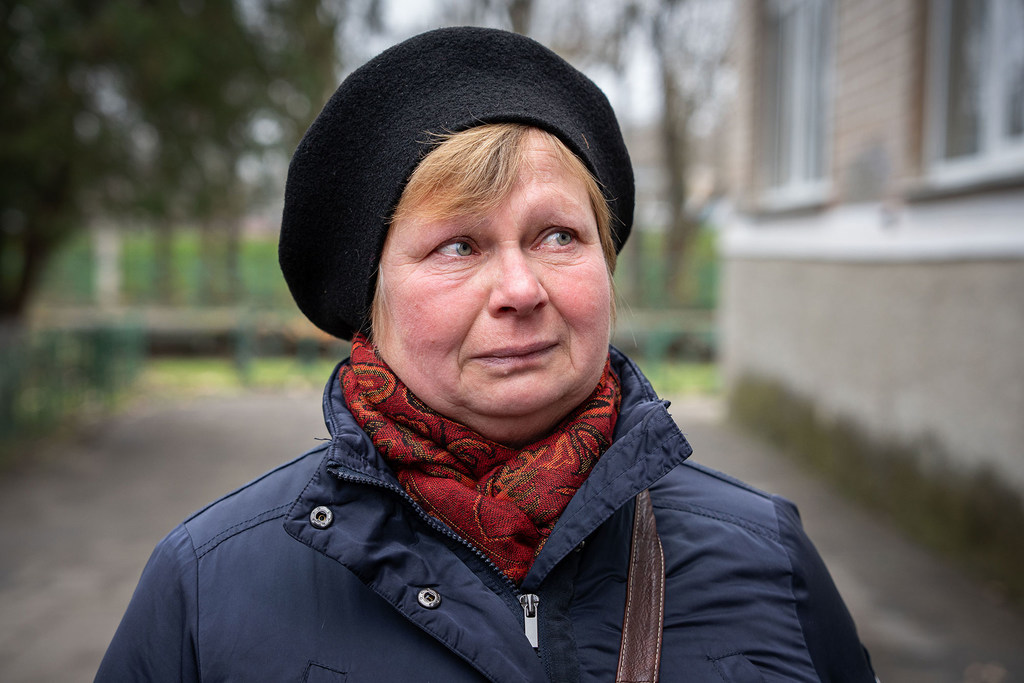 The woman is from Kherson and lives near the red zone. She came to the humanitarian hub to receive humanitarian assistance.