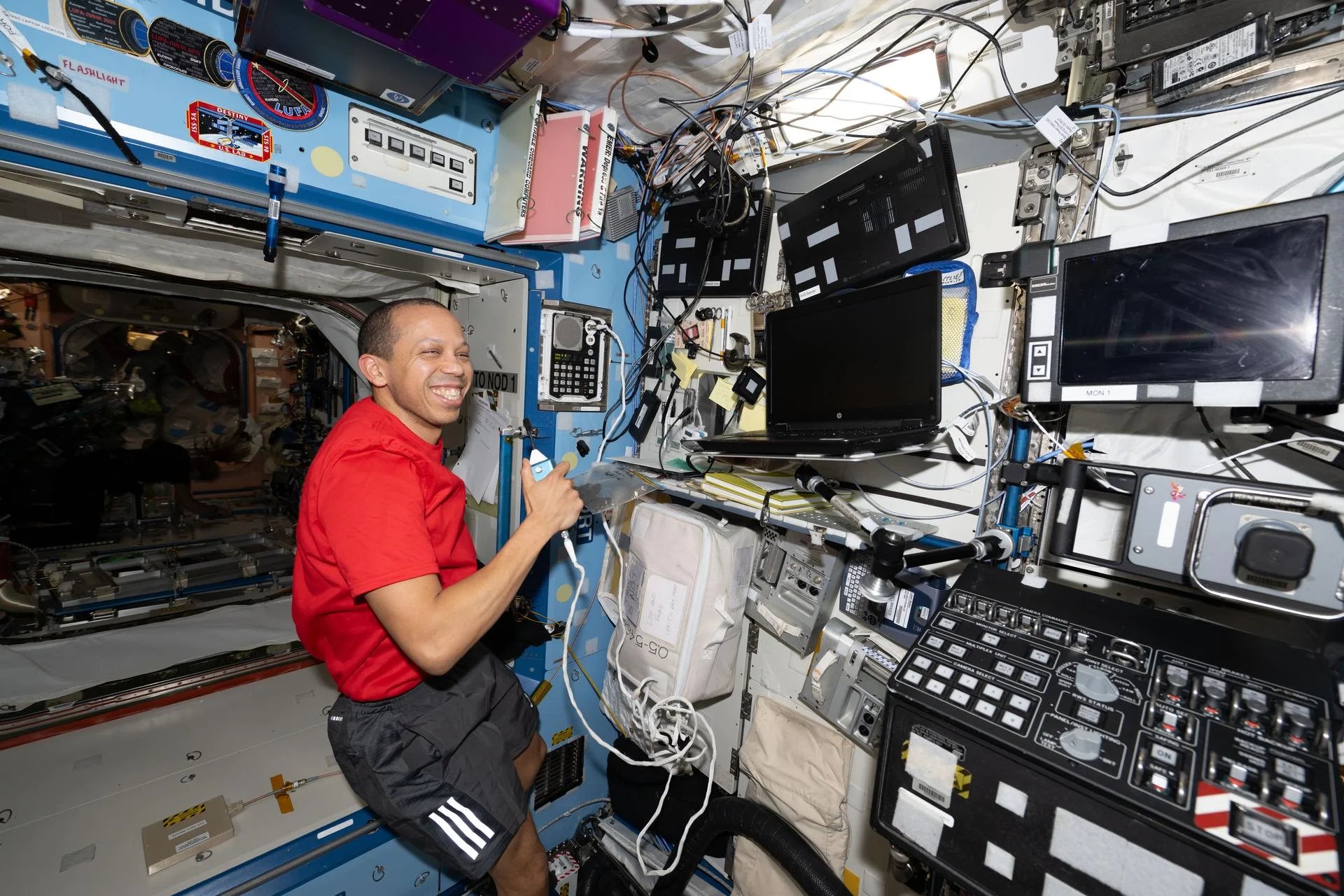 NASA astronaut Chris Williams calls down to mission controllers during Crew Medical Officer training.